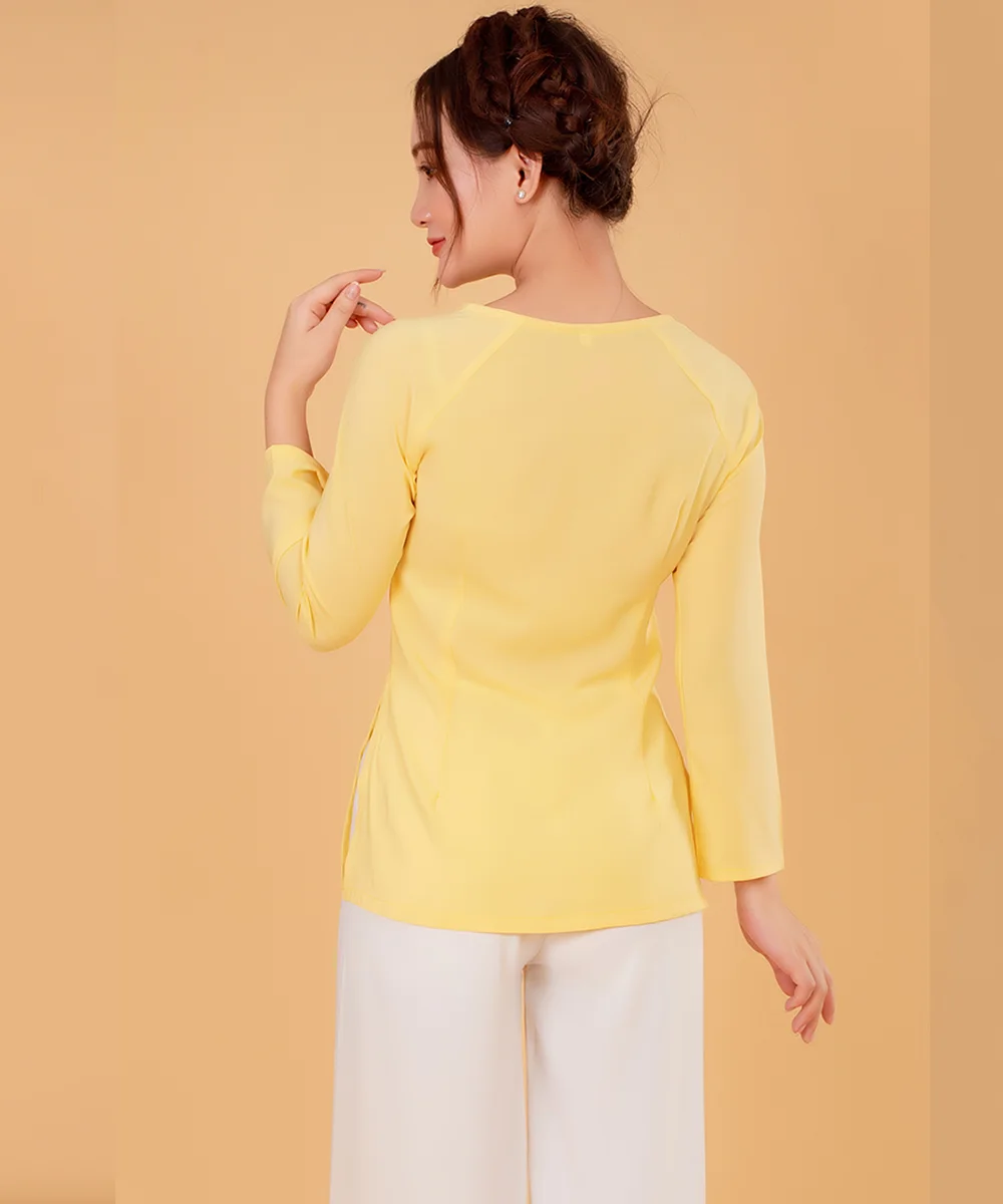 Áo Bà Ba Nữ Màu Vàng Nhạt Tay Dài Phối Quần Trắng - ảnh 4